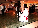 Brian taking the garter off Rebecca