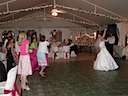Rebecca throwing the bouquet, notice how the women actually try to catch it.